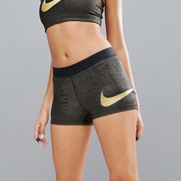 gold nike pro shorts